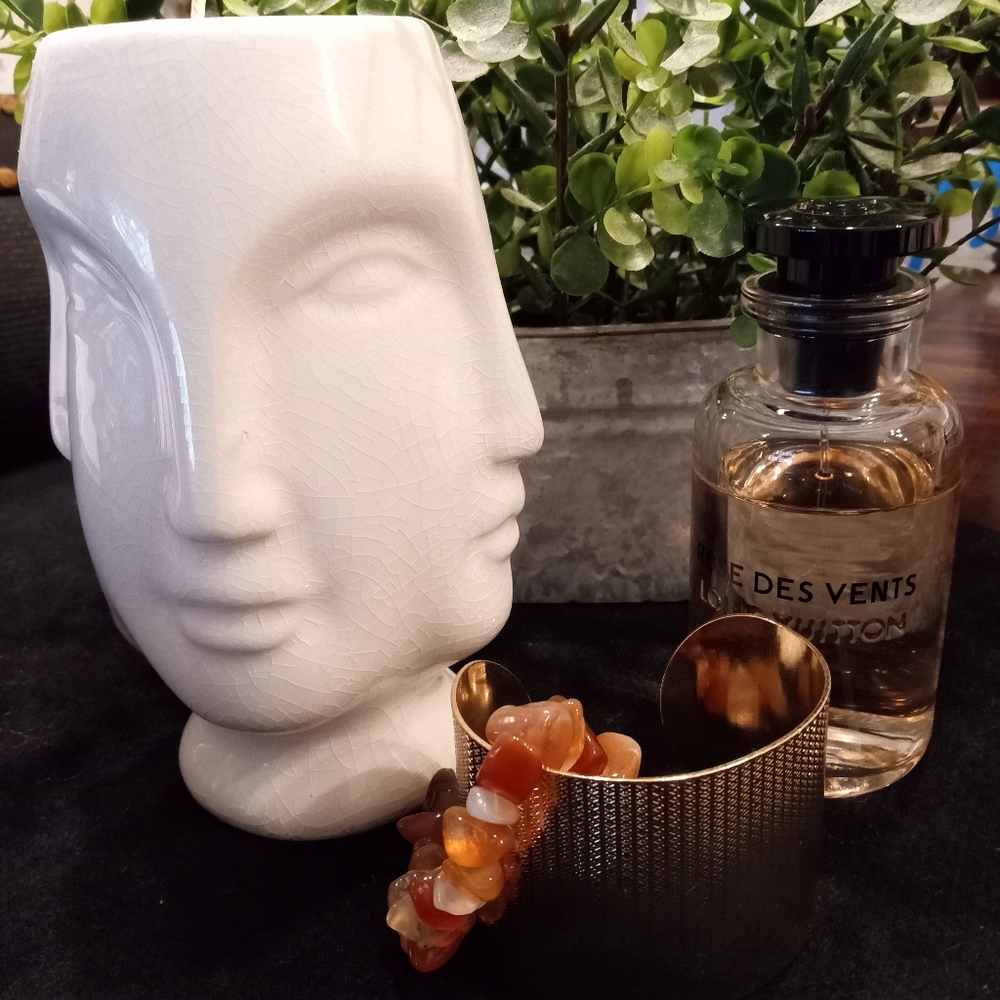 Four faces vase candle